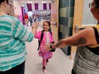 Irwin Jacobs school teachers welcome students as they enter the building for their first day of class, as students across New Bedford return to school.  [ PETER PEREIRA/THE STANDARD-TIMES/SCMG ]